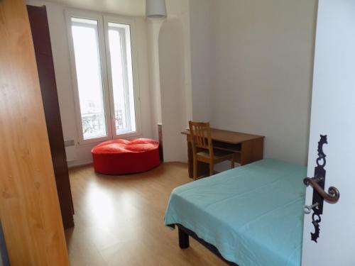 Ένα ή περισσότερα κρεβάτια σε δωμάτιο στο Residence Cathedrale