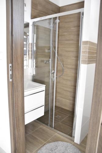 Kúpeľňa v ubytovaní Mazuria Apartamenty