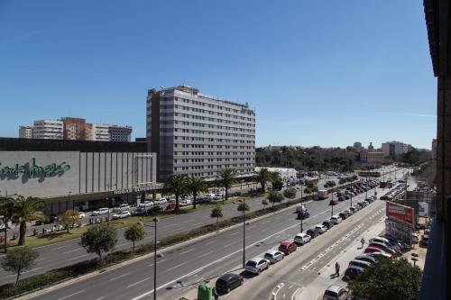 a view of a city street with cars parked at Pio XII Apartments Valencia in Valencia