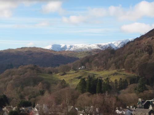 a view of a mountain range with snow covered mountains at Barnes Fell Apartments in Ambleside