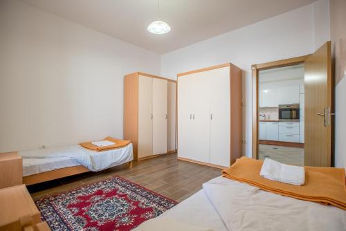 Posteľ alebo postele v izbe v ubytovaní Apartment Piran