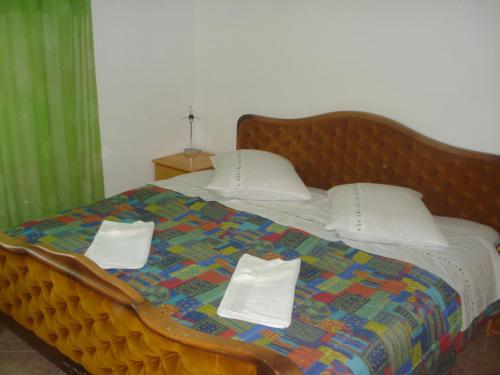 A bed or beds in a room at Apartments San Giorgio