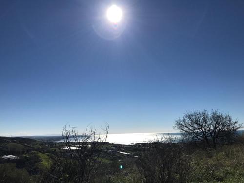 a view of the sun from a hill at I Cardinali in Santa Marinella