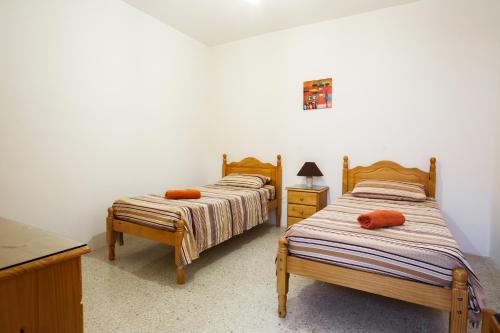 Cama o camas de una habitación en Dolphin Court