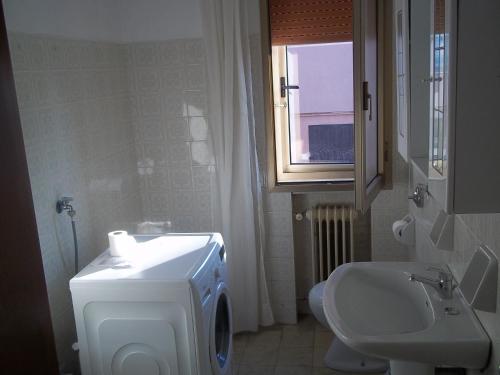 Vonios kambarys apgyvendinimo įstaigoje Appartamento Gronda Lagunare