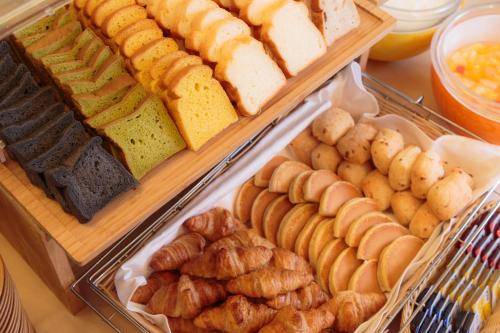 a buffet of different types of bread and pastries at Hotel Monterey Nagasaki in Nagasaki