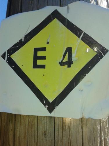 a sign with the number forty four on it at Nives in Nimfaíon