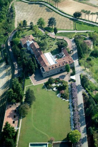 an overhead view of a large building with a park at Villa Ottolenghi Wedekind in Acqui Terme