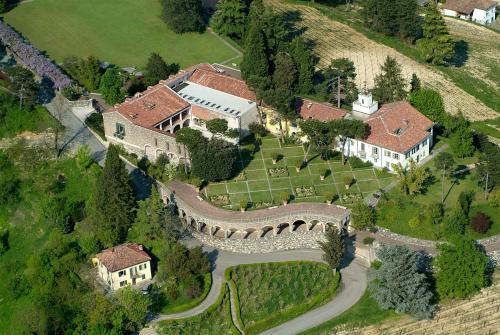 an aerial view of a mansion with a wall at Villa Ottolenghi Wedekind in Acqui Terme