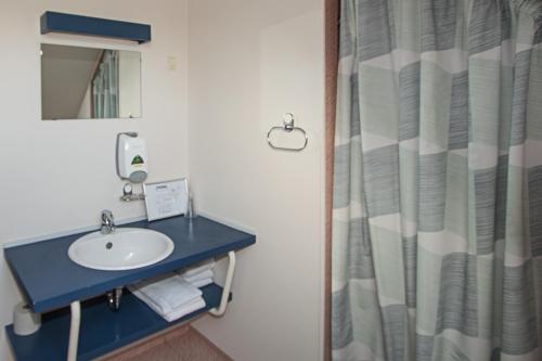 Ett badrum på Agerbæk Hotel