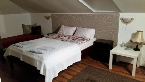 Postel nebo postele na pokoji v ubytování Guest house Elit