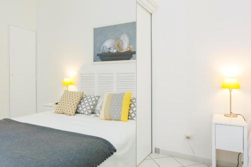 B&B Piazza Frattiにあるベッド
