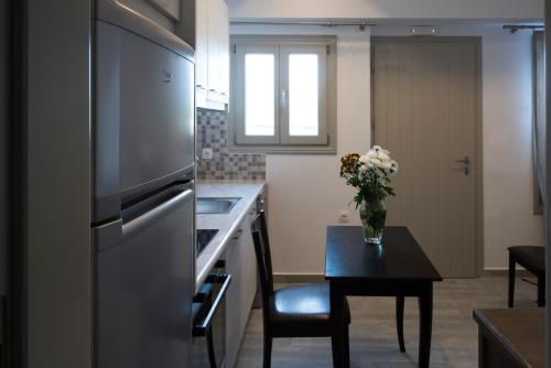 Una cocina o cocineta en Rose Suites
