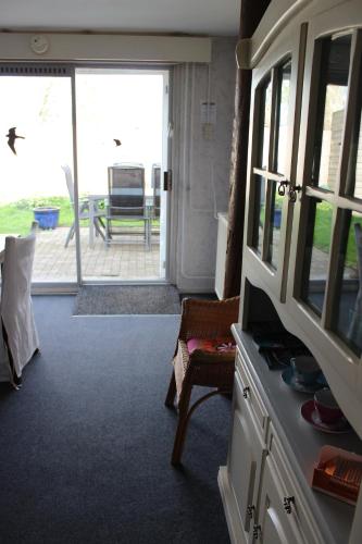 Posezení v ubytování Desokkeraai - Sauna & Hottub privé appartement in schuur
