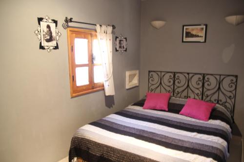 Katil atau katil-katil dalam bilik di Maison d'hôtes Dar El Nath