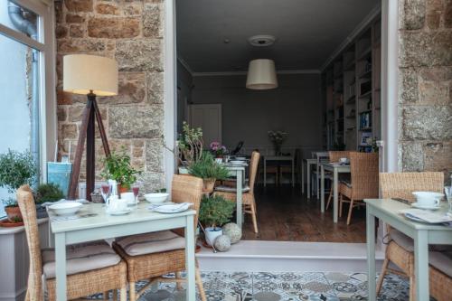 Restaurant o un lloc per menjar a Headland House Luxury B&B