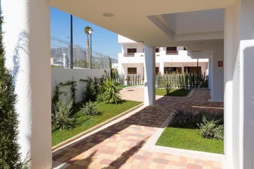 a view of the front yard of a house at Mar de Pulpí Las Azucenas by Mar Holidays in San Juan de los Terreros