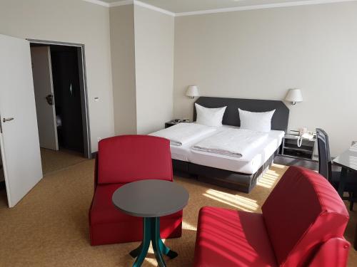 Katil atau katil-katil dalam bilik di Hotel Wörth