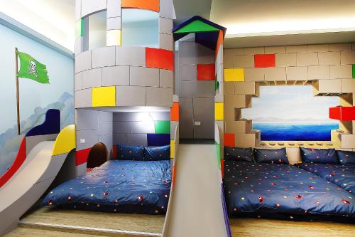 a lego house bedroom with a bunk bed at Jack Castle in Tainan
