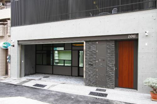 a building with a door on the side of it at Jack Castle in Tainan