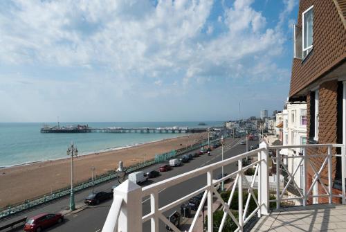 a view of a beach and the ocean from a balcony at The Lanes Hotel in Brighton & Hove