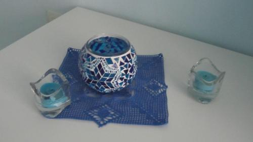 three blue and white vases sitting on a table at Il Giovaiellino in Belpasso