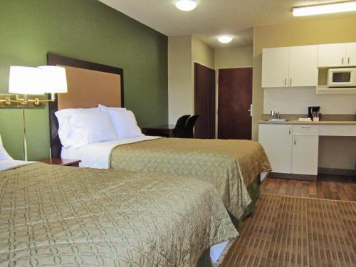 Ένα ή περισσότερα κρεβάτια σε δωμάτιο στο Extended Stay America Suites - Toledo - Holland