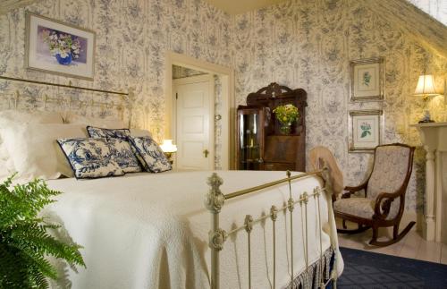 Katil atau katil-katil dalam bilik di Berry Manor Inn