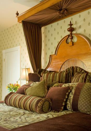 Katil atau katil-katil dalam bilik di Berry Manor Inn