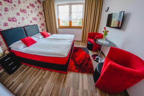 Posteľ alebo postele v izbe v ubytovaní Penzion Panda