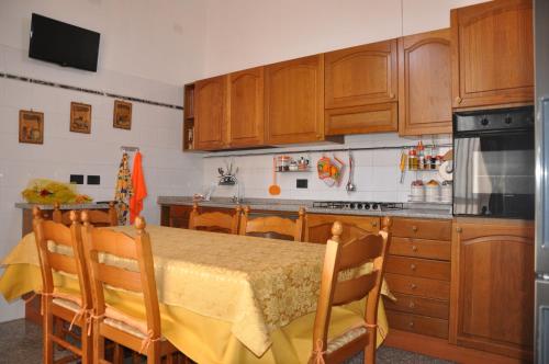 Kuchyň nebo kuchyňský kout v ubytování Villa Del Poeta