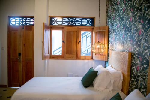 Letto o letti in una camera di Hotel Boutique Casa Mia