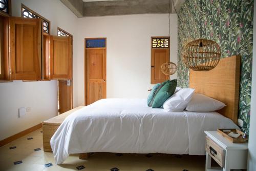 Letto o letti in una camera di Hotel Boutique Casa Mia