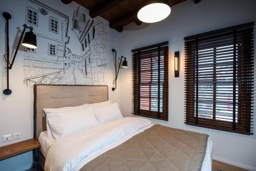 Katil atau katil-katil dalam bilik di Olganos VL Luxury Rooms & Suites