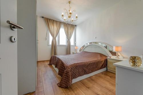a bedroom with a bed and a window at Apartment Noa - self check in in Split