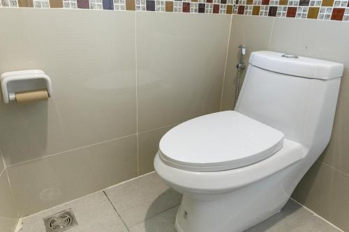 Ένα μπάνιο στο Tuana Hotels Brook Pool Access