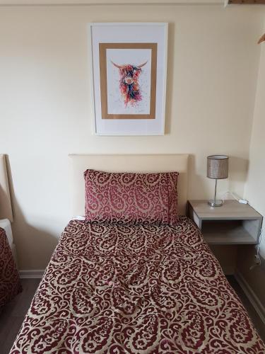 Una cama o camas en una habitación de Grant Rooms