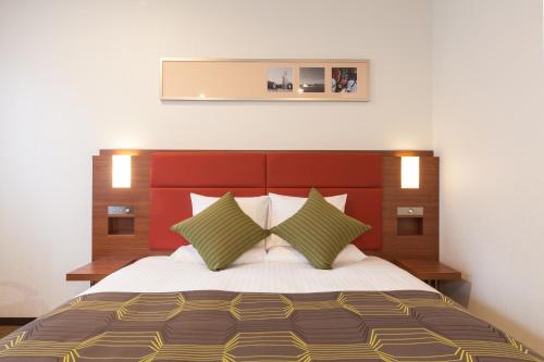 Cama o camas de una habitación en HOTEL MYSTAYS Haneda