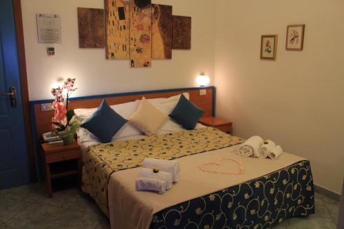 Cama o camas de una habitación en Hotel Paradise