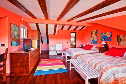 En eller flere senge i et værelse på Luxury Villa Golf Tenerife