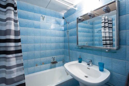 Ванна кімната в The Hollidays Apartment