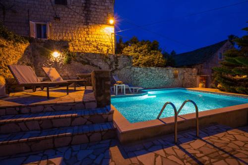 The swimming pool at or near Apartments Kralj