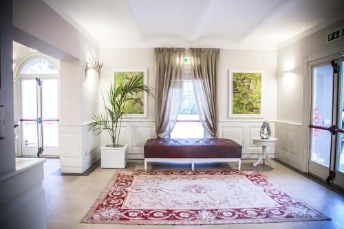 Ένα ή περισσότερα κρεβάτια σε δωμάτιο στο Villa Giorgia Albergo in Collina