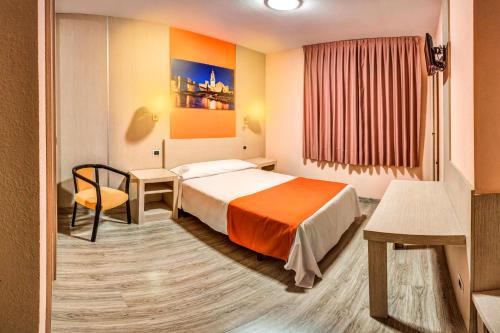 Ένα ή περισσότερα κρεβάτια σε δωμάτιο στο Hotel Spa Rio Ucero