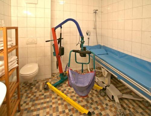 a hospital room with a bed and a sink at Haus Renate in Kaunertal