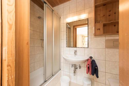 a bathroom with a sink and a shower at Haus Renate in Kaunertal