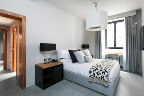 Una cama o camas en una habitación de Parioli Place B&B