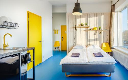 Vuode tai vuoteita majoituspaikassa Hektor Design Hostel