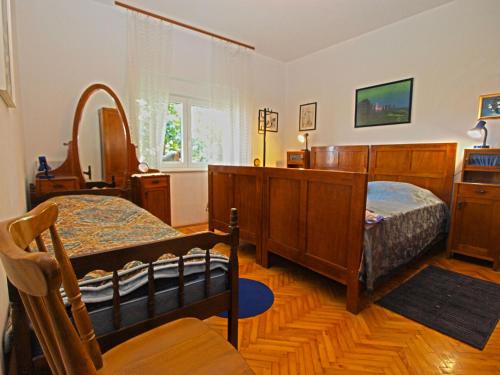 Postel nebo postele na pokoji v ubytování Apartments Jadranka 461