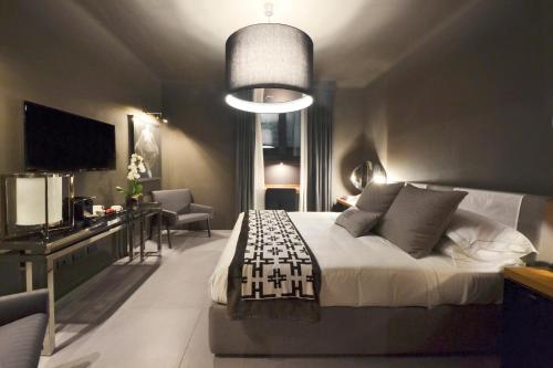 Una cama o camas en una habitación de Parioli Place B&B